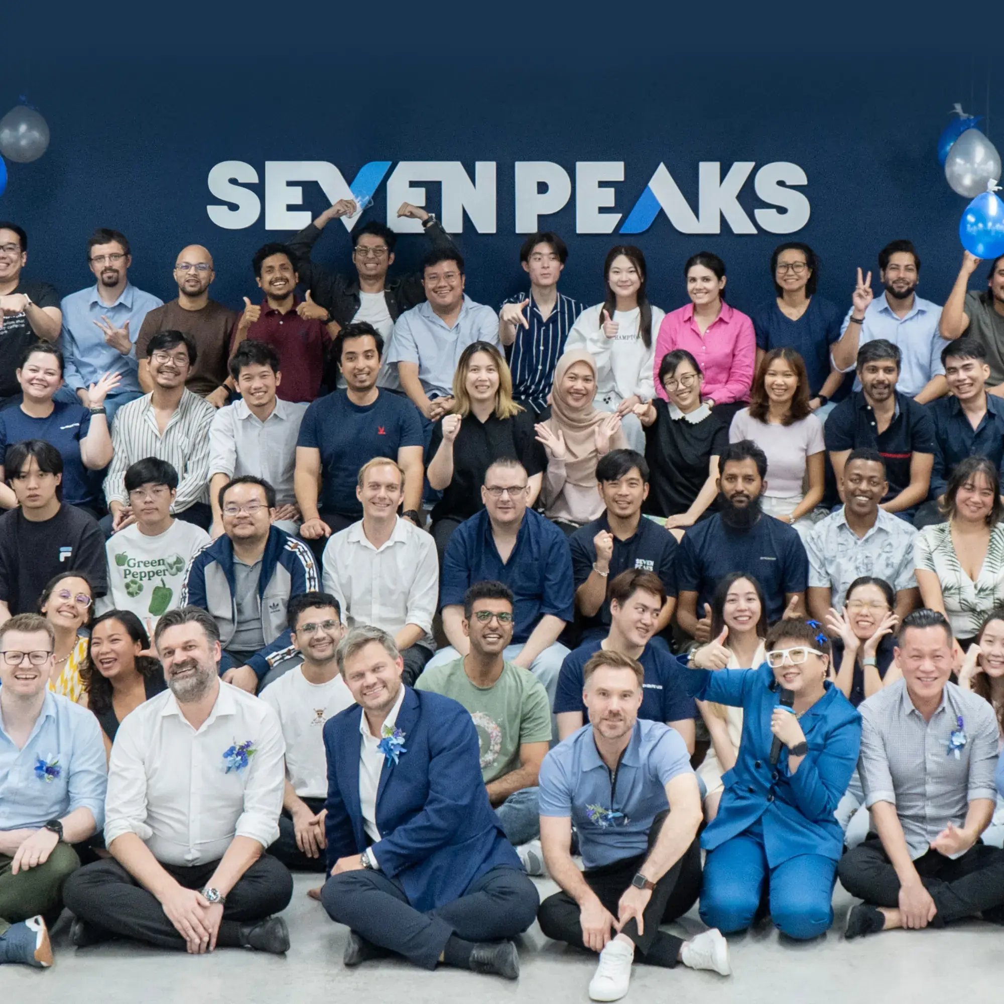 seven-peaks-company-team-group-photo-square